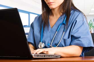 direct hire female nurse on laptop
